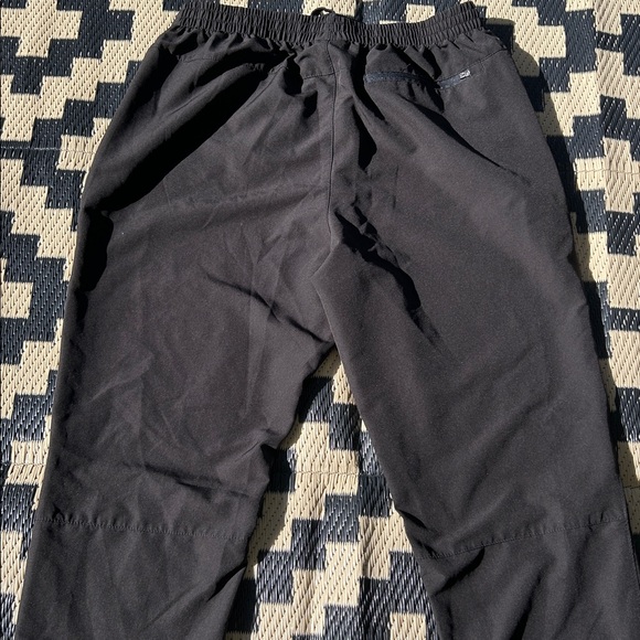 New Balance Men’s Black Athletic Pants with Ankle Zip Detail and Pockets - Picture 4 of 6